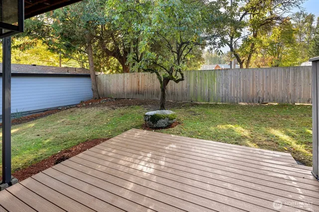 a backyard of a house with lots of green space