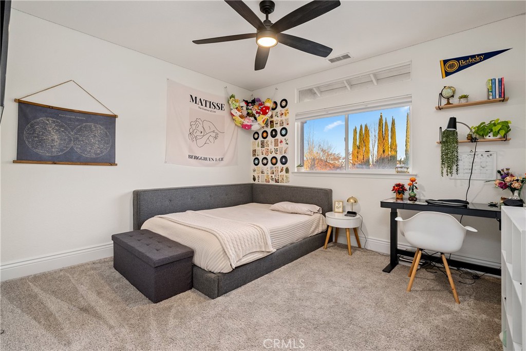 1926 Kleck Road Paso Robles, CA 93446 - Photo 20 of 29 a bedroom with a bed and a chandelier