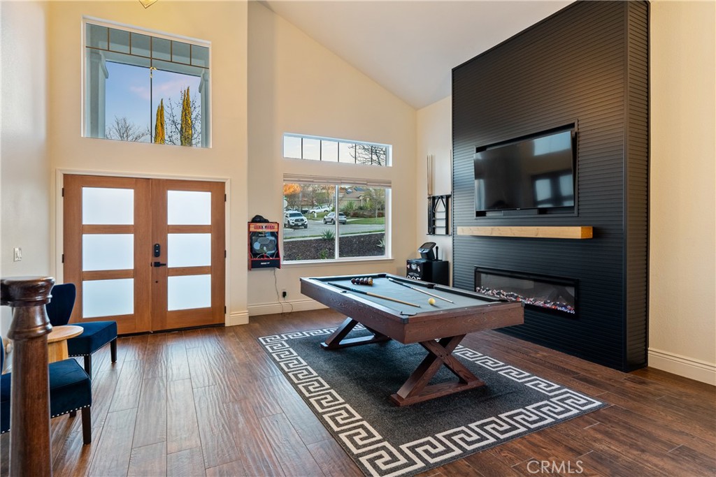 1926 Kleck Road Paso Robles, CA 93446 - Photo 3 of 29 a living room with furniture a flat screen tv and wooden floor