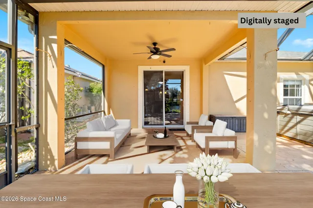a view of a kitchen with wooden floor and staircase