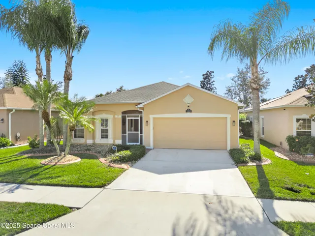 a kitchen with stainless steel appliances granite countertop a stove and a refrigerator