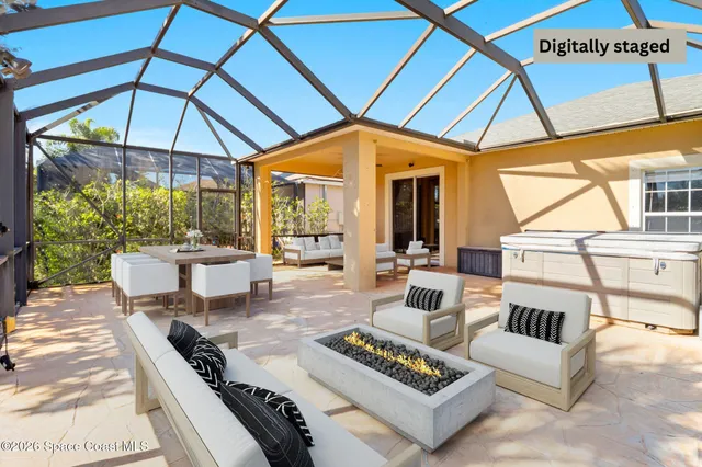 a view of a livingroom with furniture window and wooden floor