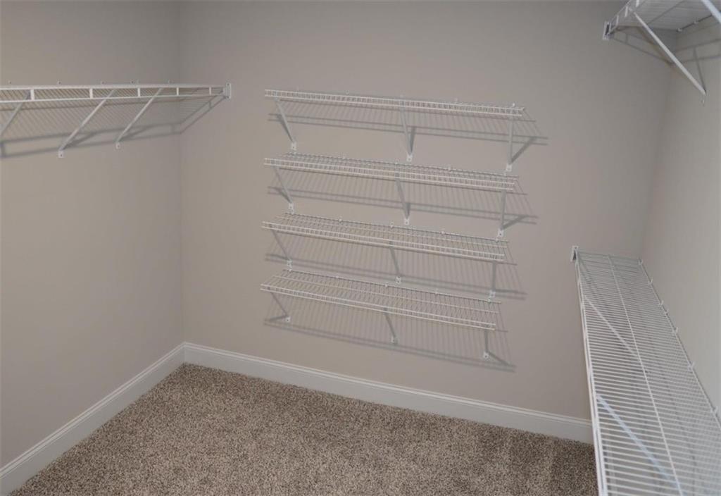 309 Bermuda Ridge Perry, GA 31069 - Photo 21 of 33 a view of a room with racks on the wall