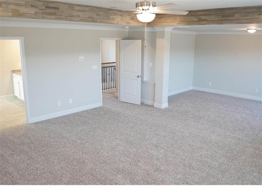 309 Bermuda Ridge Perry, GA 31069 - Photo 23 of 33 an empty room with chandelier fan