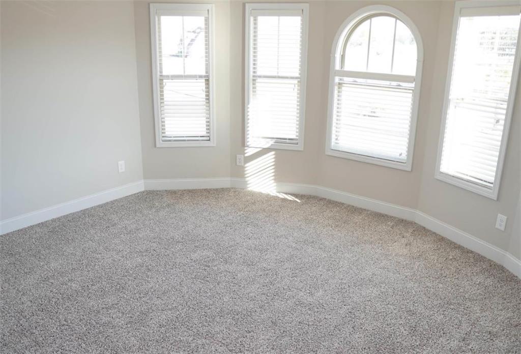 309 Bermuda Ridge Perry, GA 31069 - Photo 27 of 33 an empty room with a window