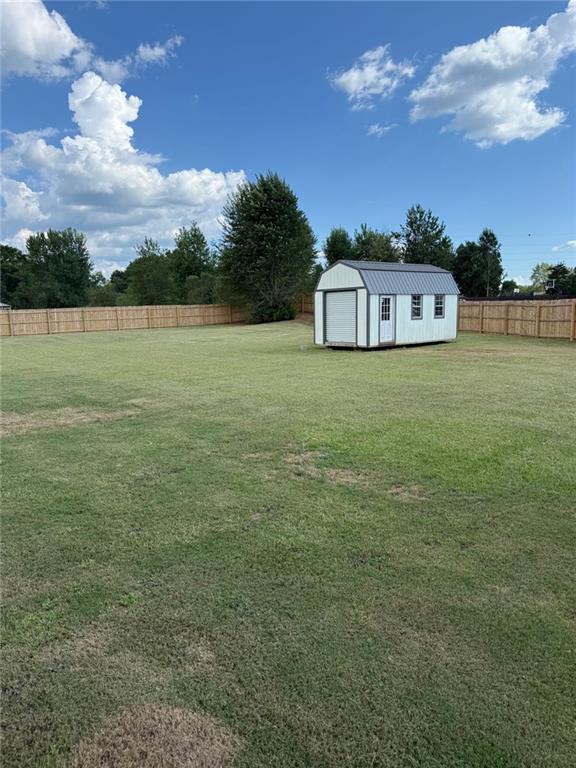 309 Bermuda Ridge Perry, GA 31069 - Photo 30 of 33 a house view with a garden space