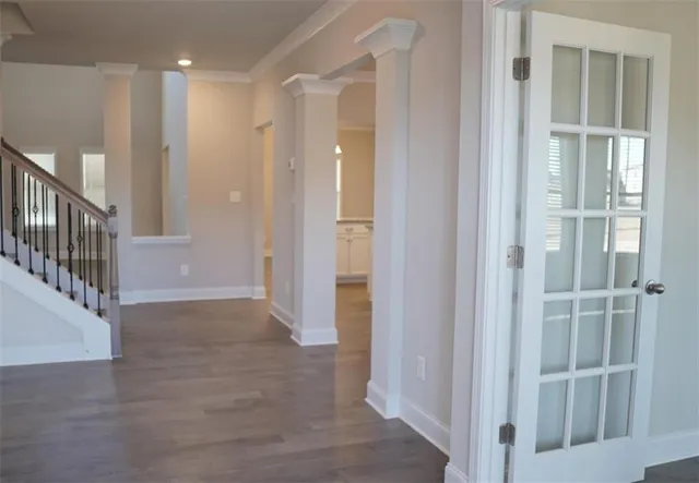 a view of entryway with wooden floor
