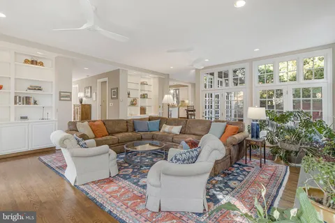 a view of staircase with white walls and a window