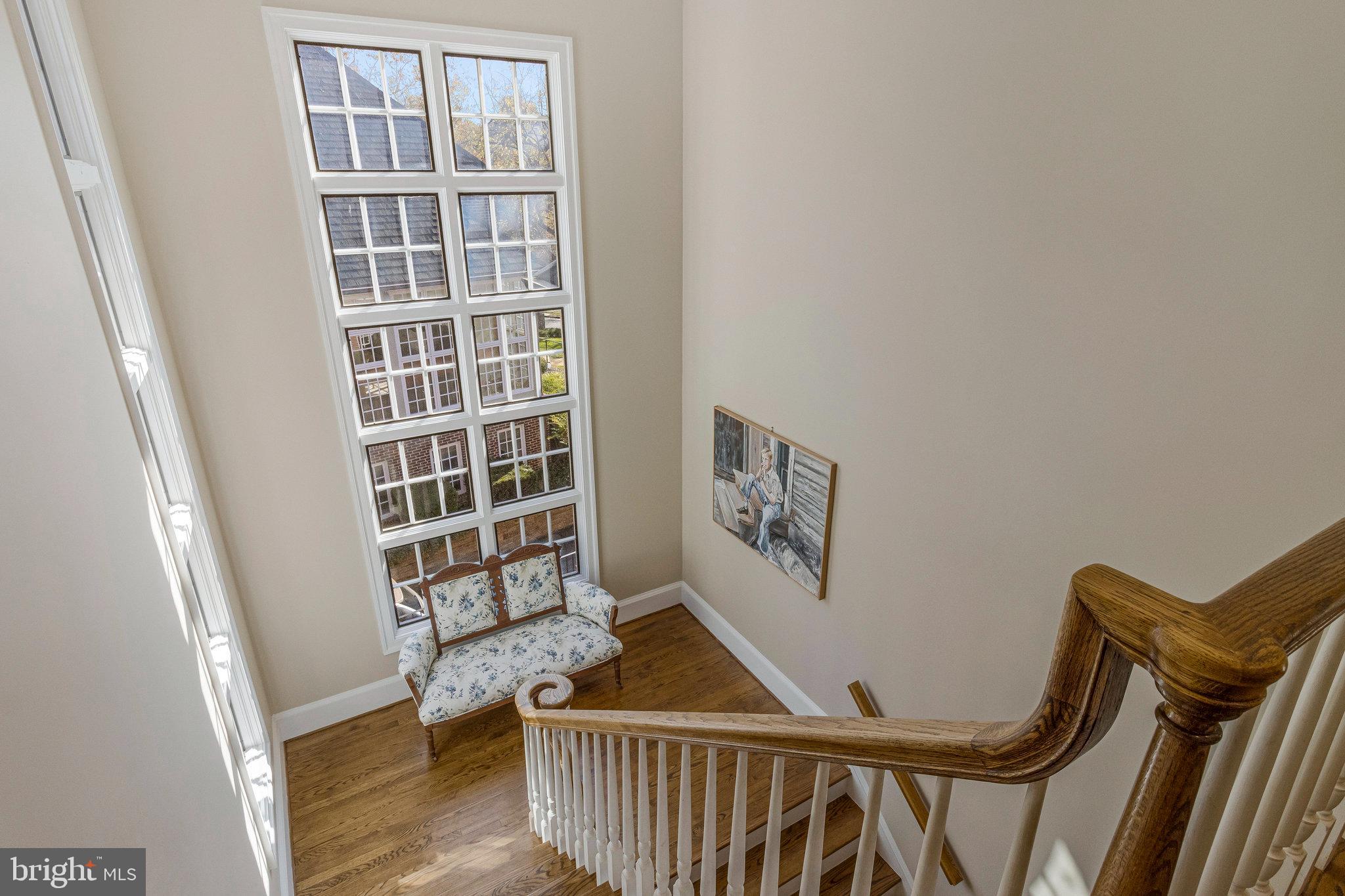 1655 Kalmia Road Northwest Washington, DC 20012 - Photo 32 of 71 a view of staircase with white walls and a window