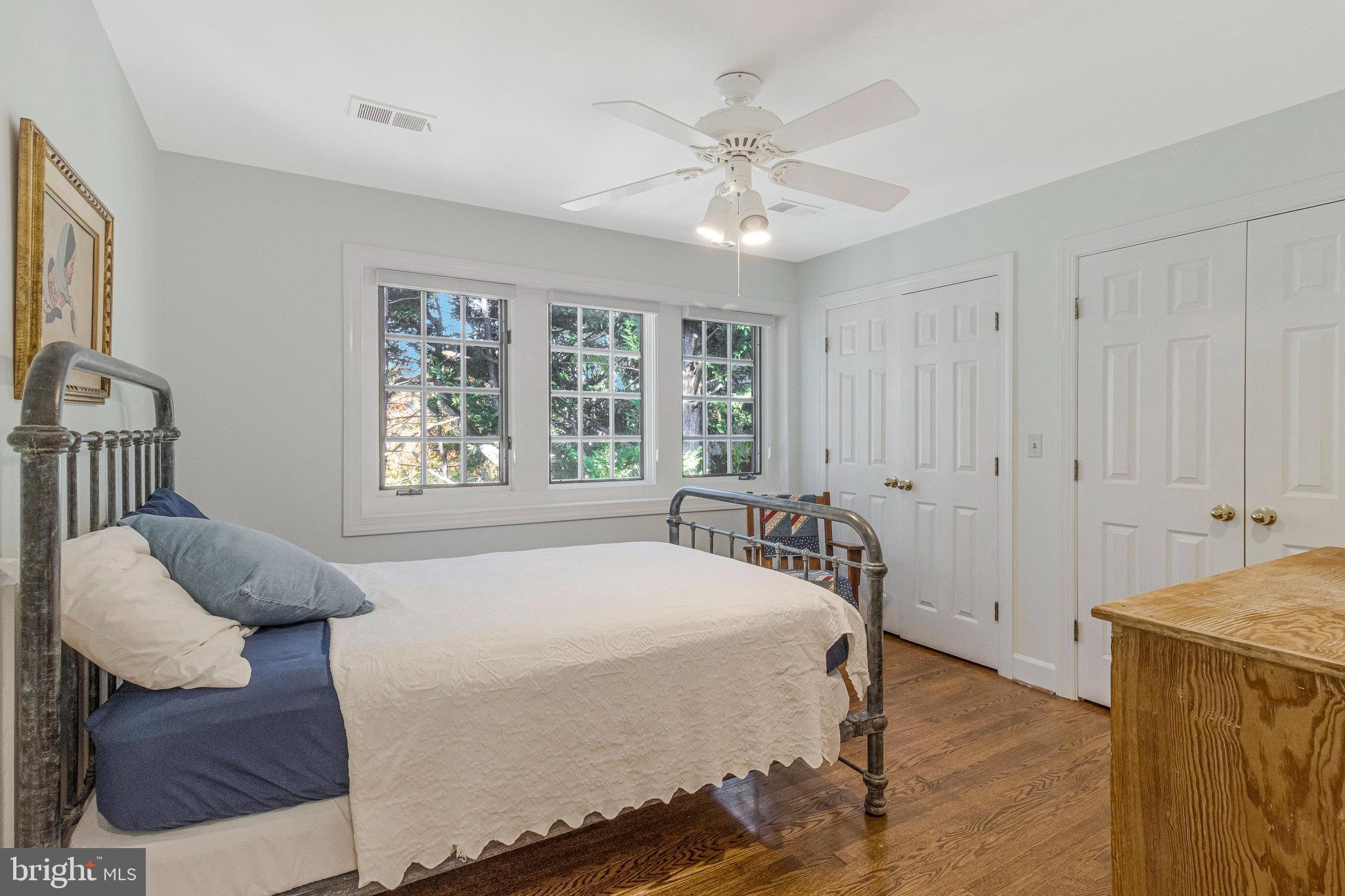 1655 Kalmia Road Northwest Washington, DC 20012 - Photo 45 of 71 a bedroom with a bed and a window