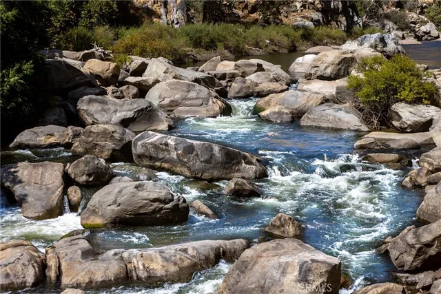 a view of swimming pool with seating space