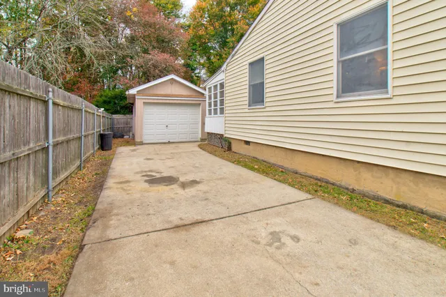 a view of a brick house with a street
