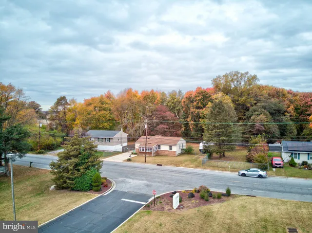 a view of a swimming pool with an outdoor seating