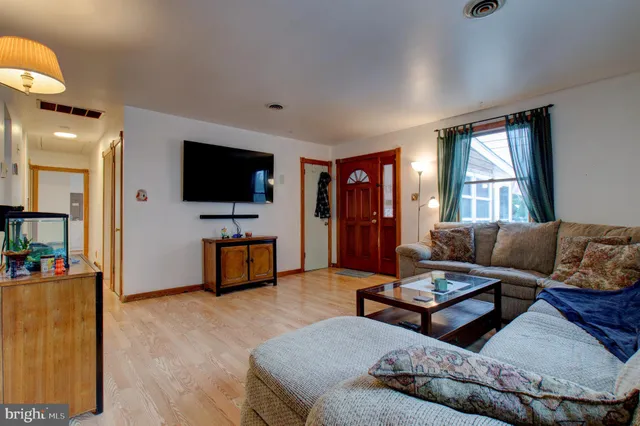 view of hall way with mirror