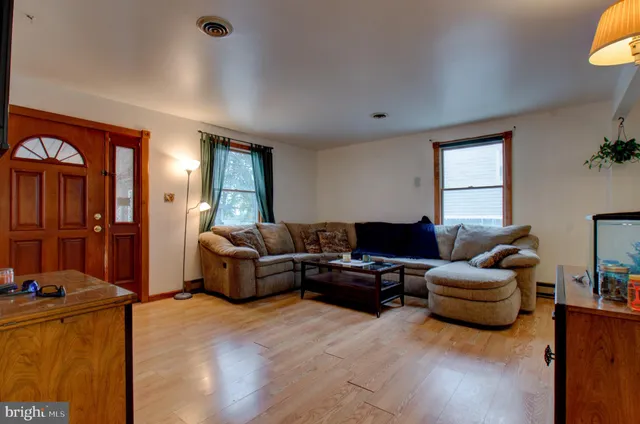 a utility room with sink dryer and washer