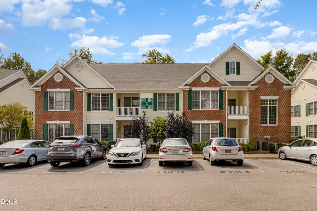 a car parked in front of a house
