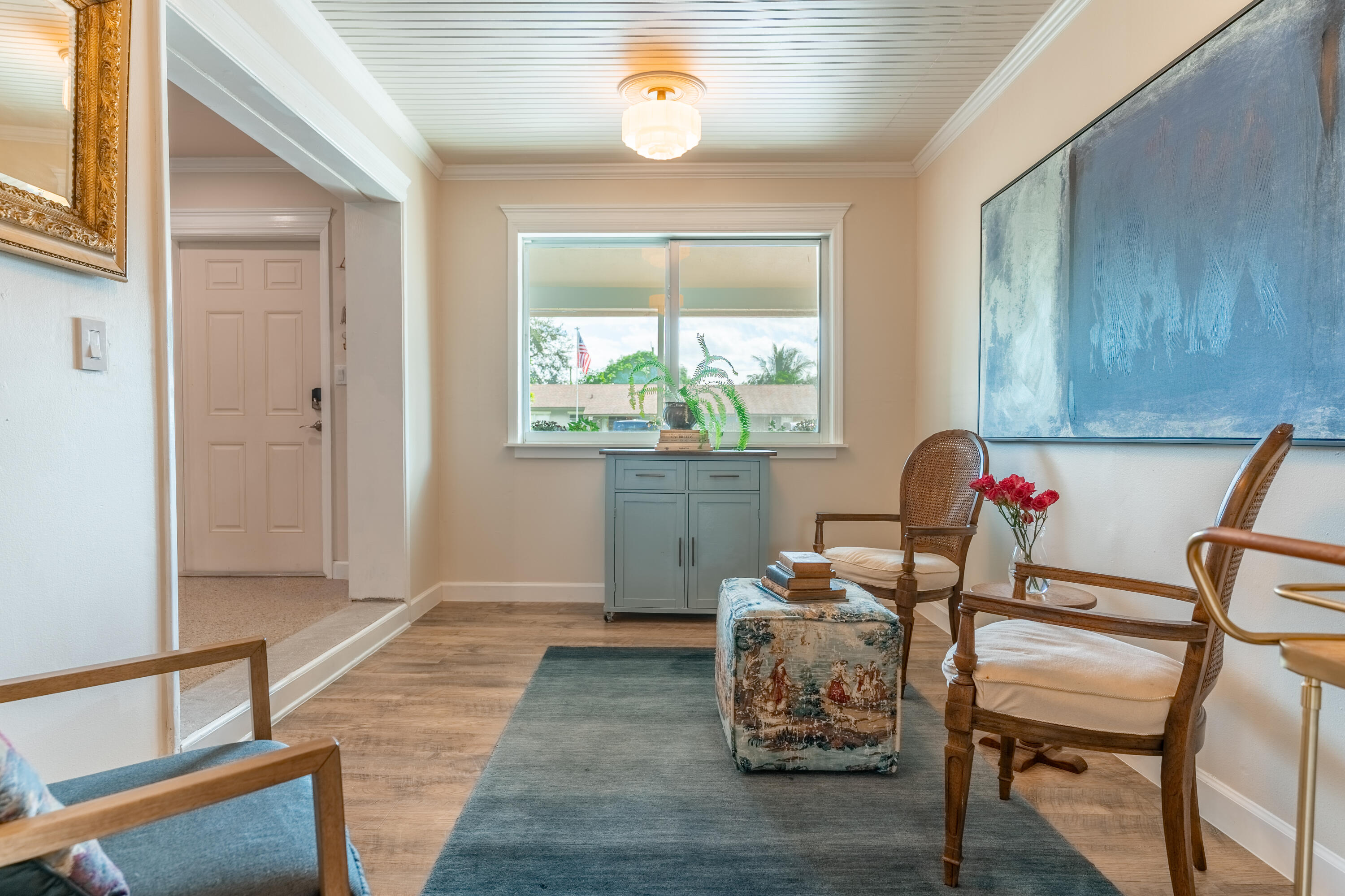 5155 Cleveland Road Delray Beach, FL 33484 - Photo 14 of 40 a room with furniture and a window