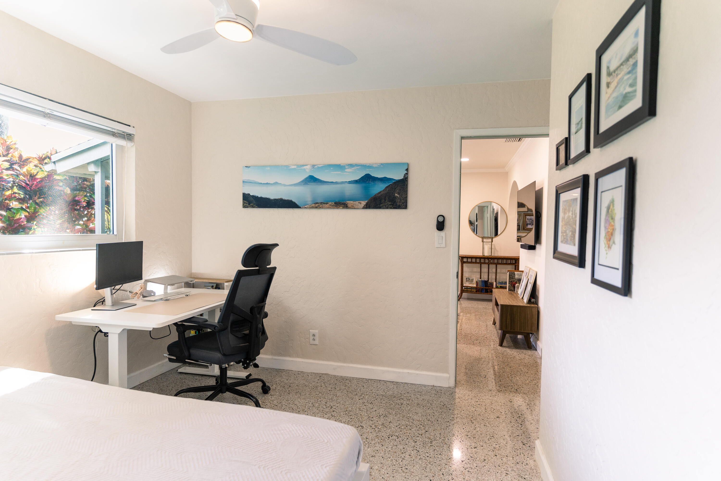 5155 Cleveland Road Delray Beach, FL 33484 - Photo 17 of 40 a view of a workspace with furniture and a window