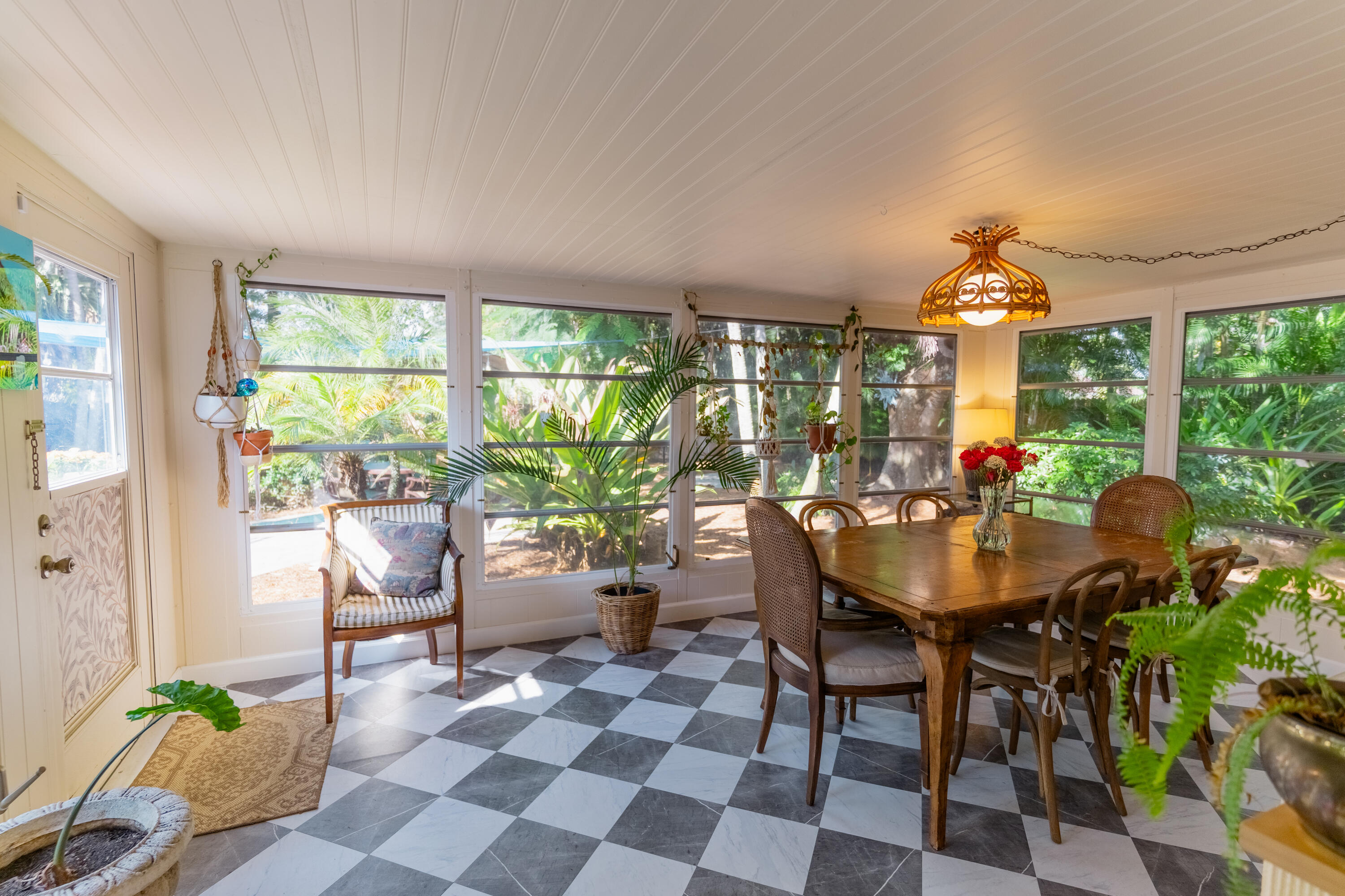 5155 Cleveland Road Delray Beach, FL 33484 - Photo 18 of 40 a view of a dining room with furniture window and outside view