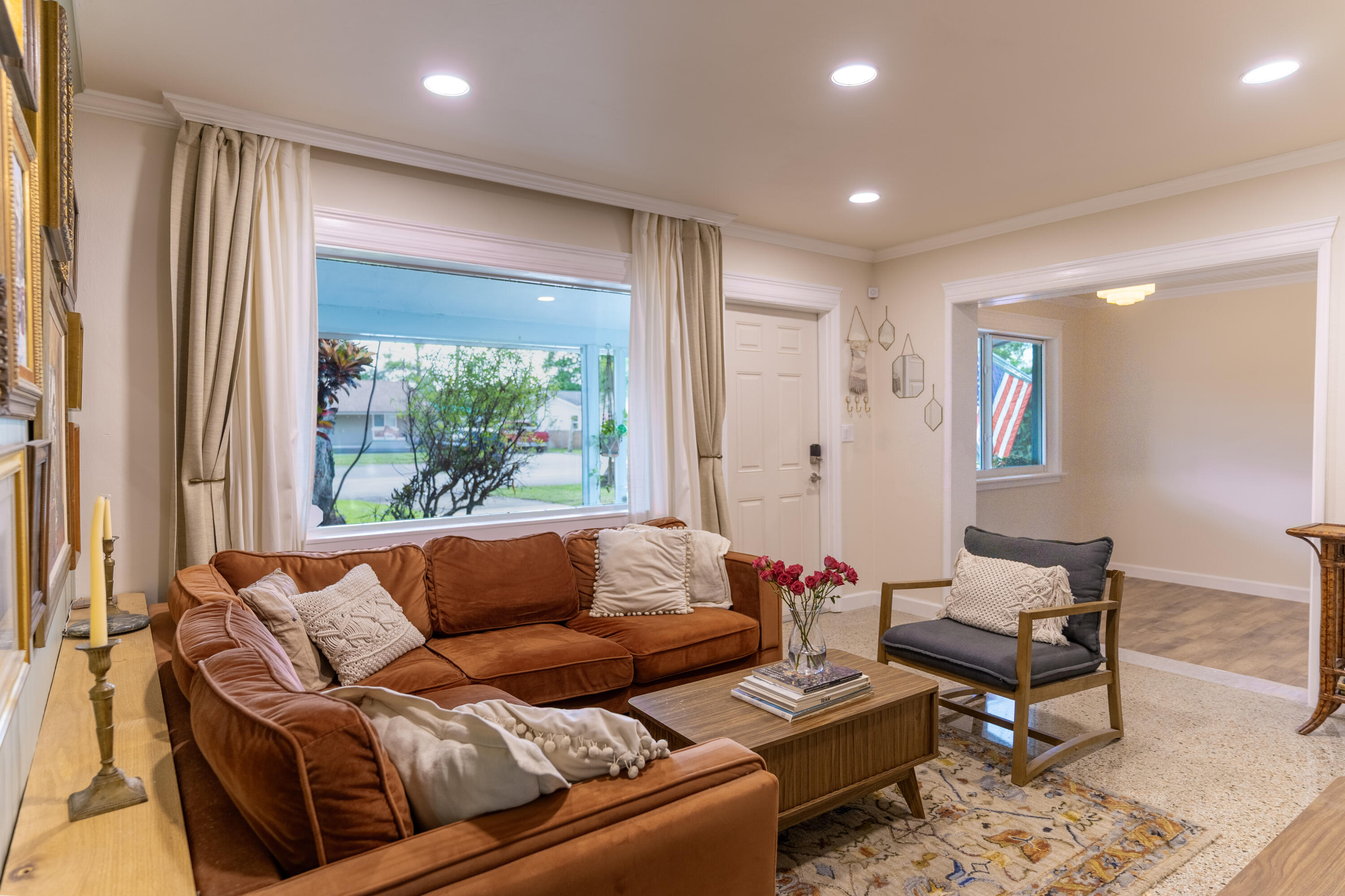 5155 Cleveland Road Delray Beach, FL 33484 - Photo 27 of 40 a living room with furniture and a large window