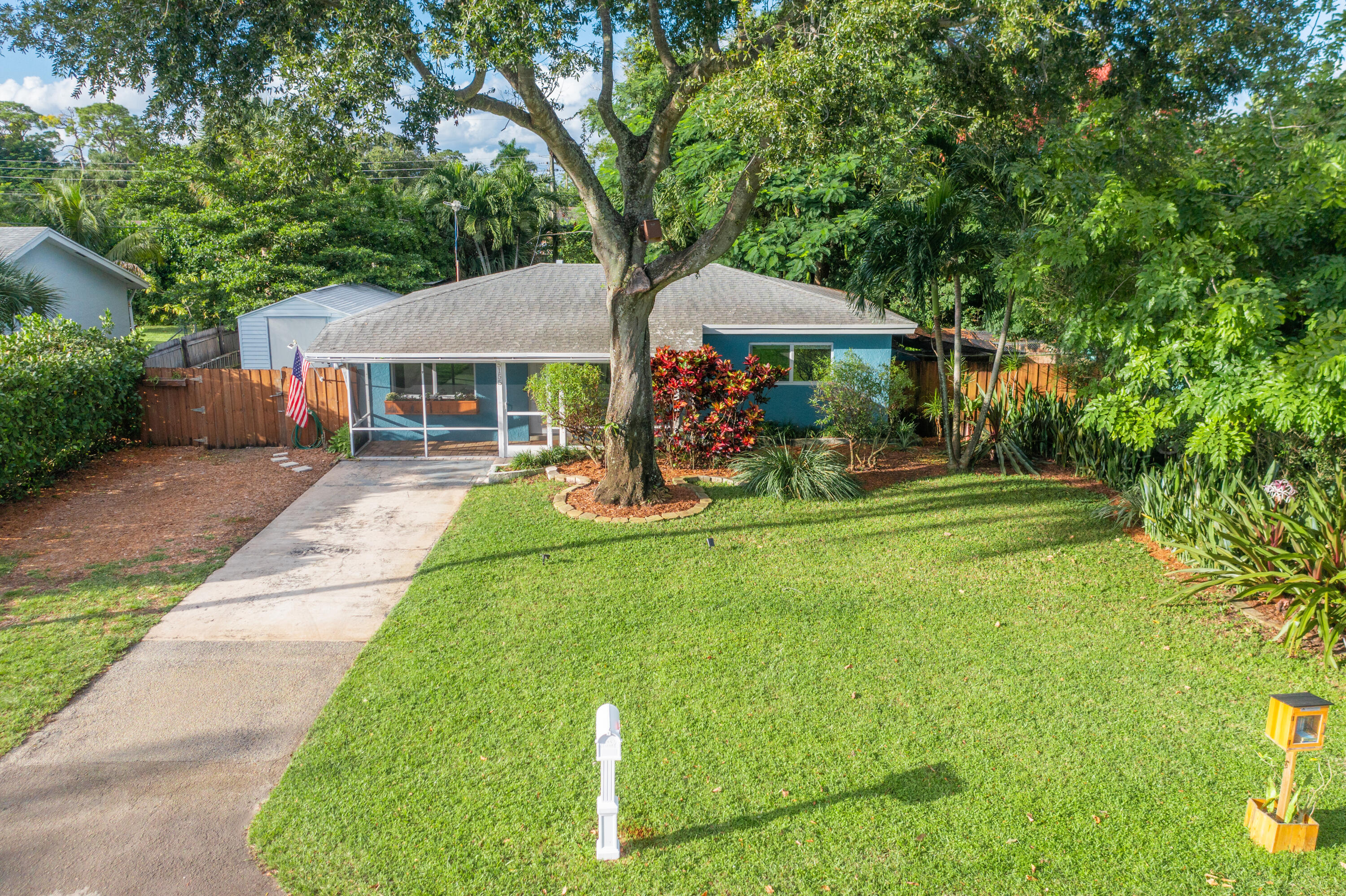 5155 Cleveland Road Delray Beach, FL 33484 - Photo 30 of 40 a view of a house with backyard