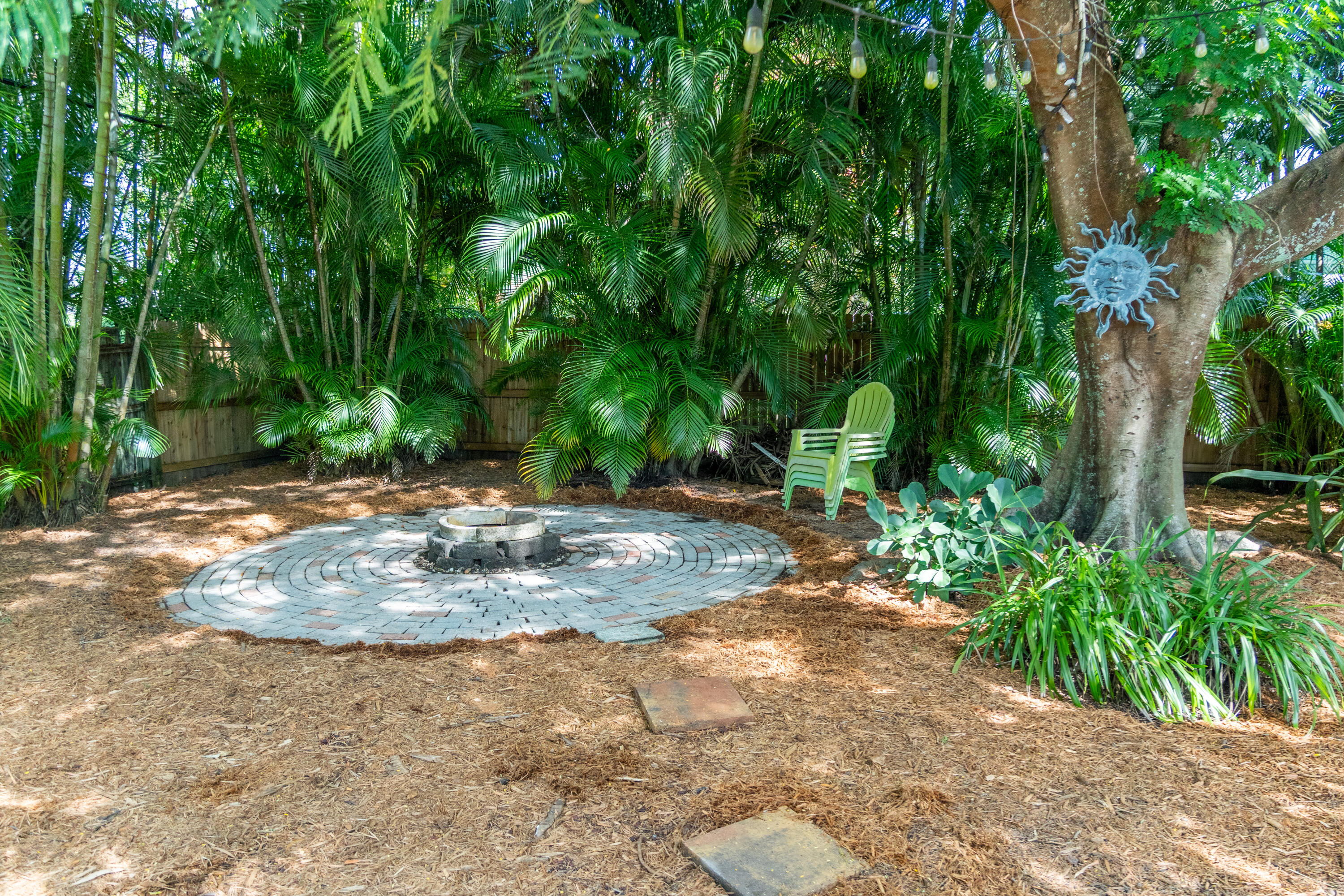5155 Cleveland Road Delray Beach, FL 33484 - Photo 33 of 40 a view of a yard with plants and trees