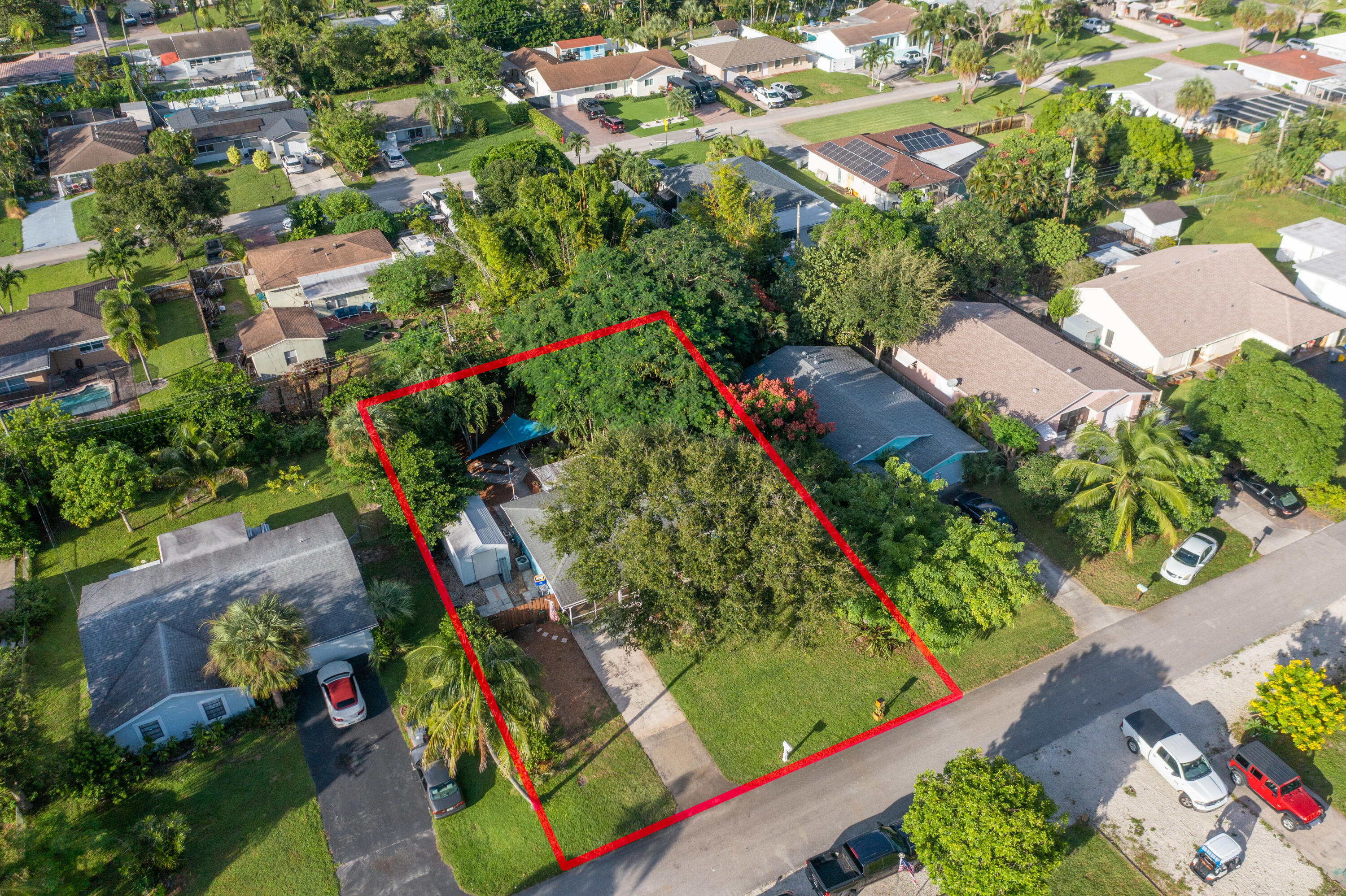 5155 Cleveland Road Delray Beach, FL 33484 - Photo 35 of 40 an aerial view of residential houses with outdoor space