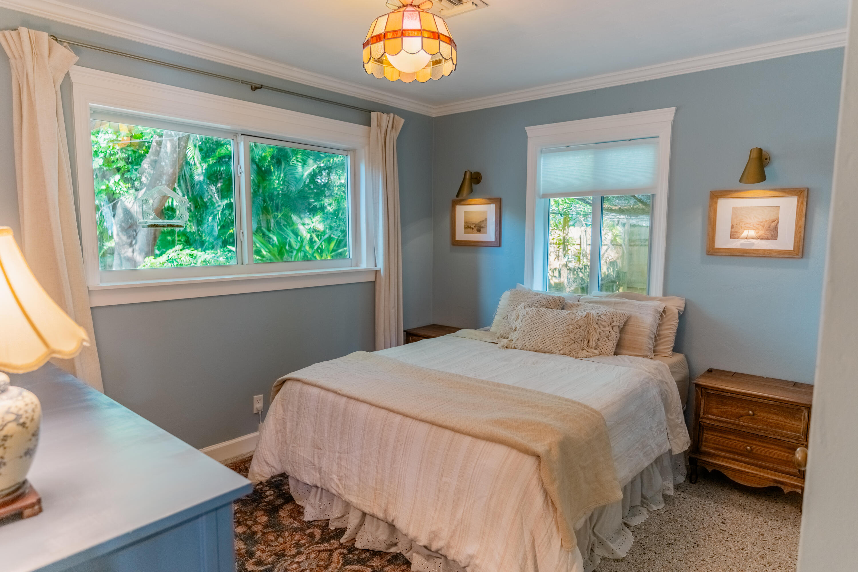 5155 Cleveland Road Delray Beach, FL 33484 - Photo 9 of 40 a bedroom with a bed and a window