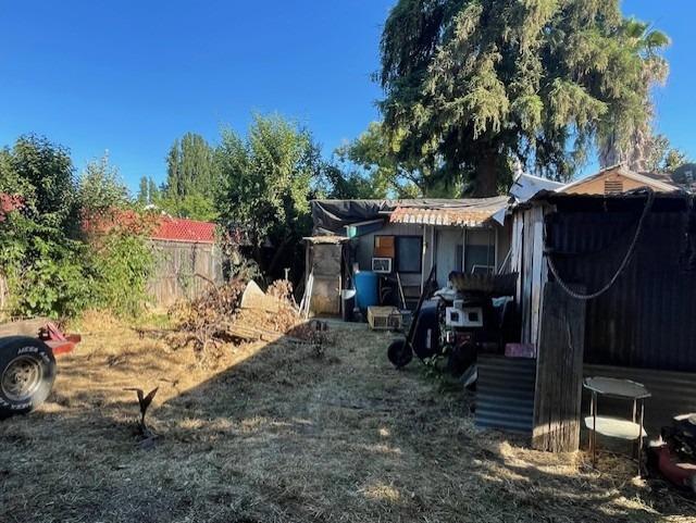 220 Little Avenue Gridley, CA 95948 - Photo 15 of 17 a view of a house with backyard and sitting area