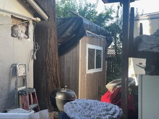 a view of balcony with furniture