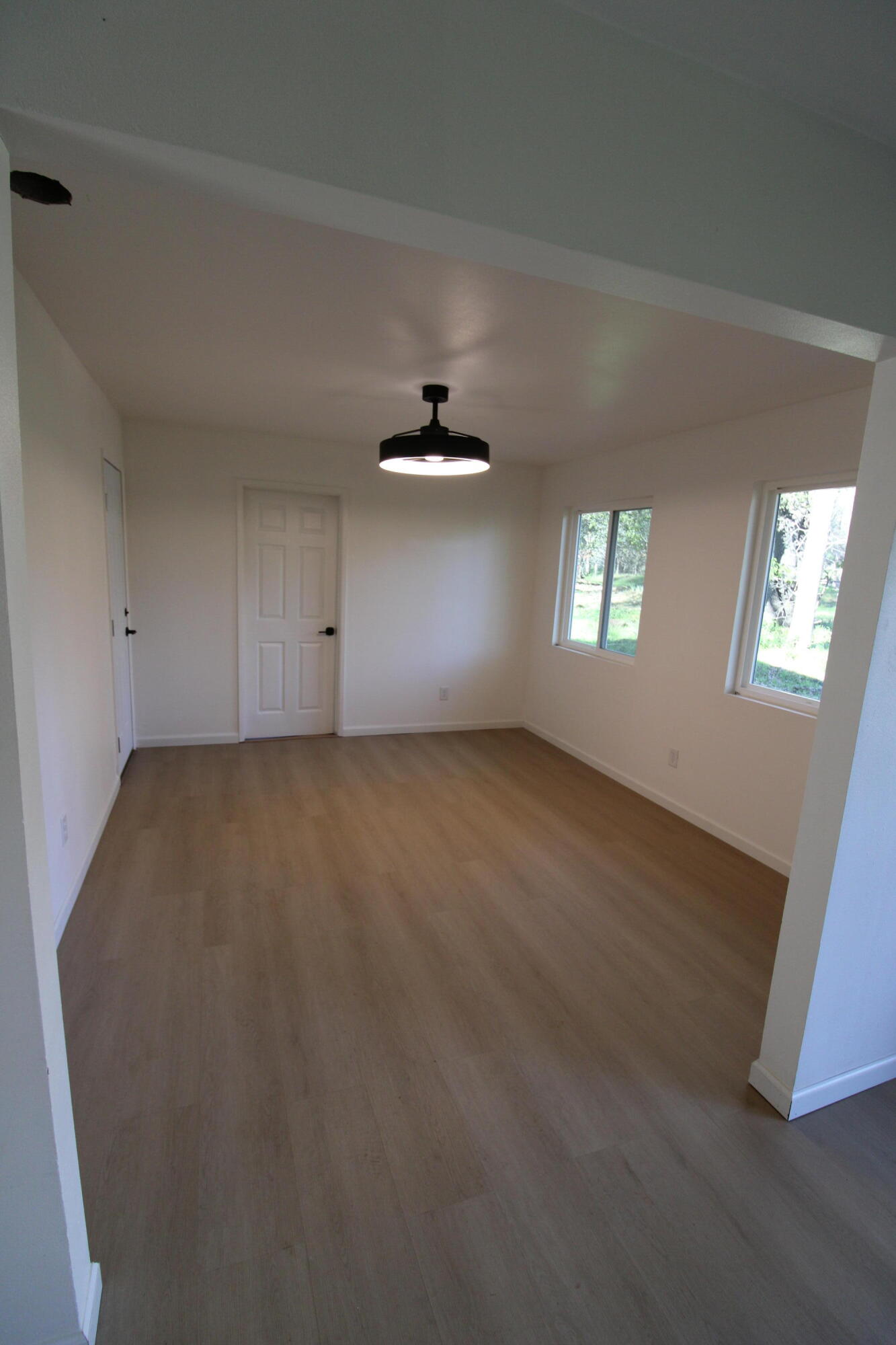 3170 Quartz Hill Road Redding, CA 96003 - Photo 21 of 68 a view of an empty room with a window