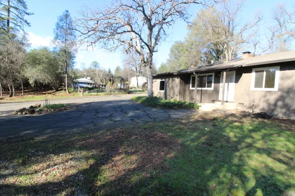 a view of backyard with green space