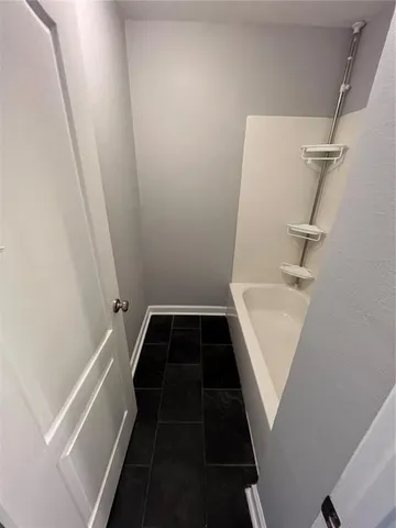 a bathroom with a bathtub