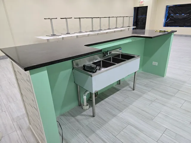 a room with furniture and a wooden floor