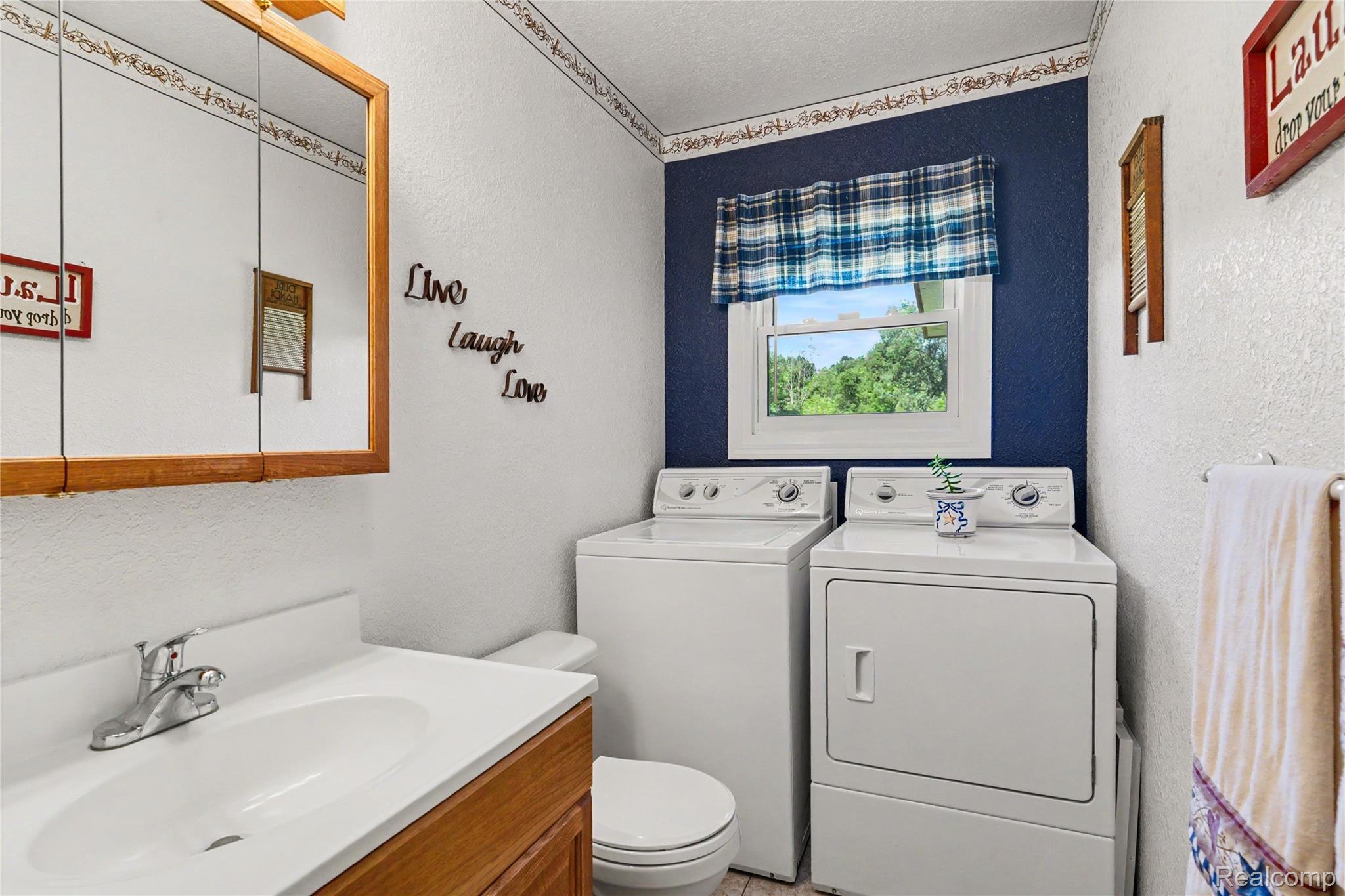 4427 North Washburn Road Davison, MI 48423 - Photo 21 of 37 Half Bath & Laundry.