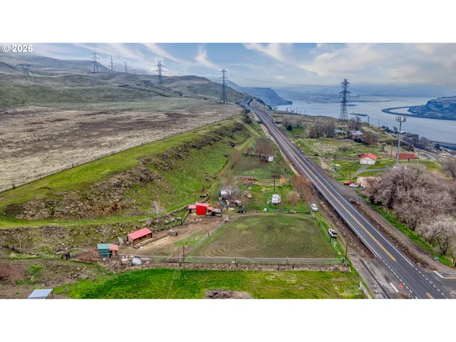 a swimming pool with trees in the background