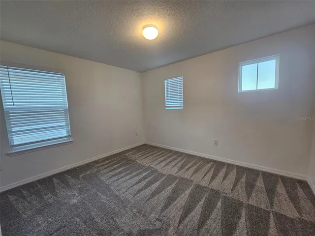 an empty room with an entryway