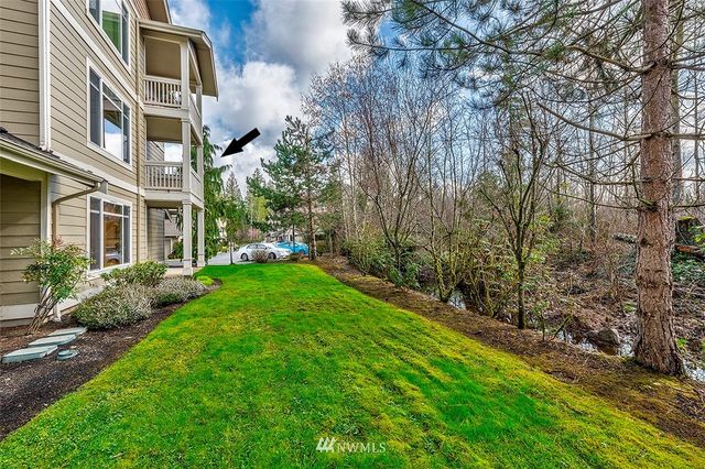 a view of a building with a yard