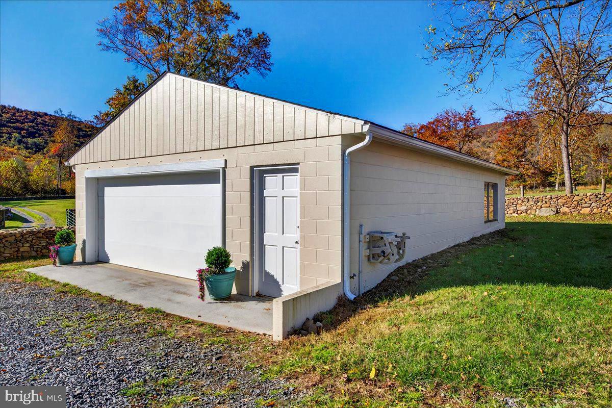290 Riley Hollow Road Huntly, VA 22640 - Photo 65 of 148 a front view of a house with garden