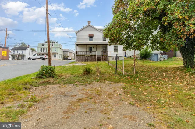 a view of front a house with a swimming pool