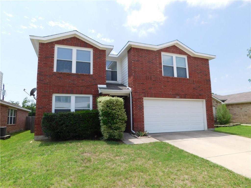 2420 Rolling Ridge Drive Little Elm, TX 75068 - Photo 1 of 1 a front view of a house with a garden