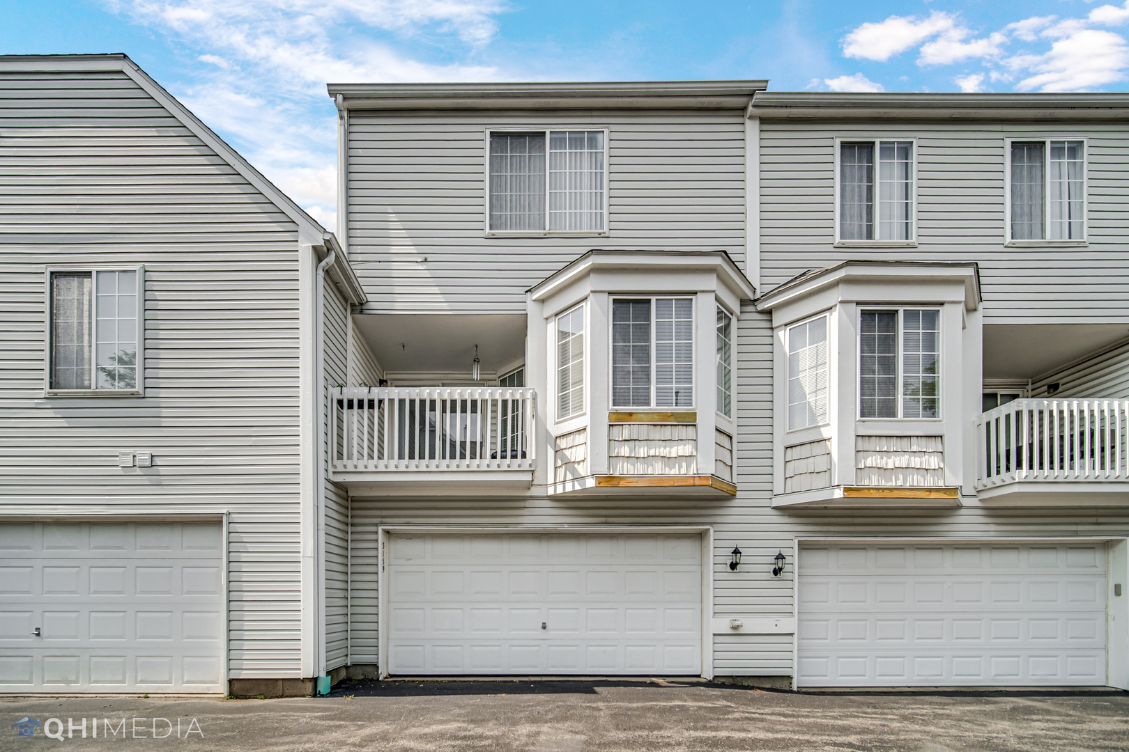 3159 Teal Bay Court Aurora, IL 60503 - Photo 21 of 22 a front view of a house with balcony