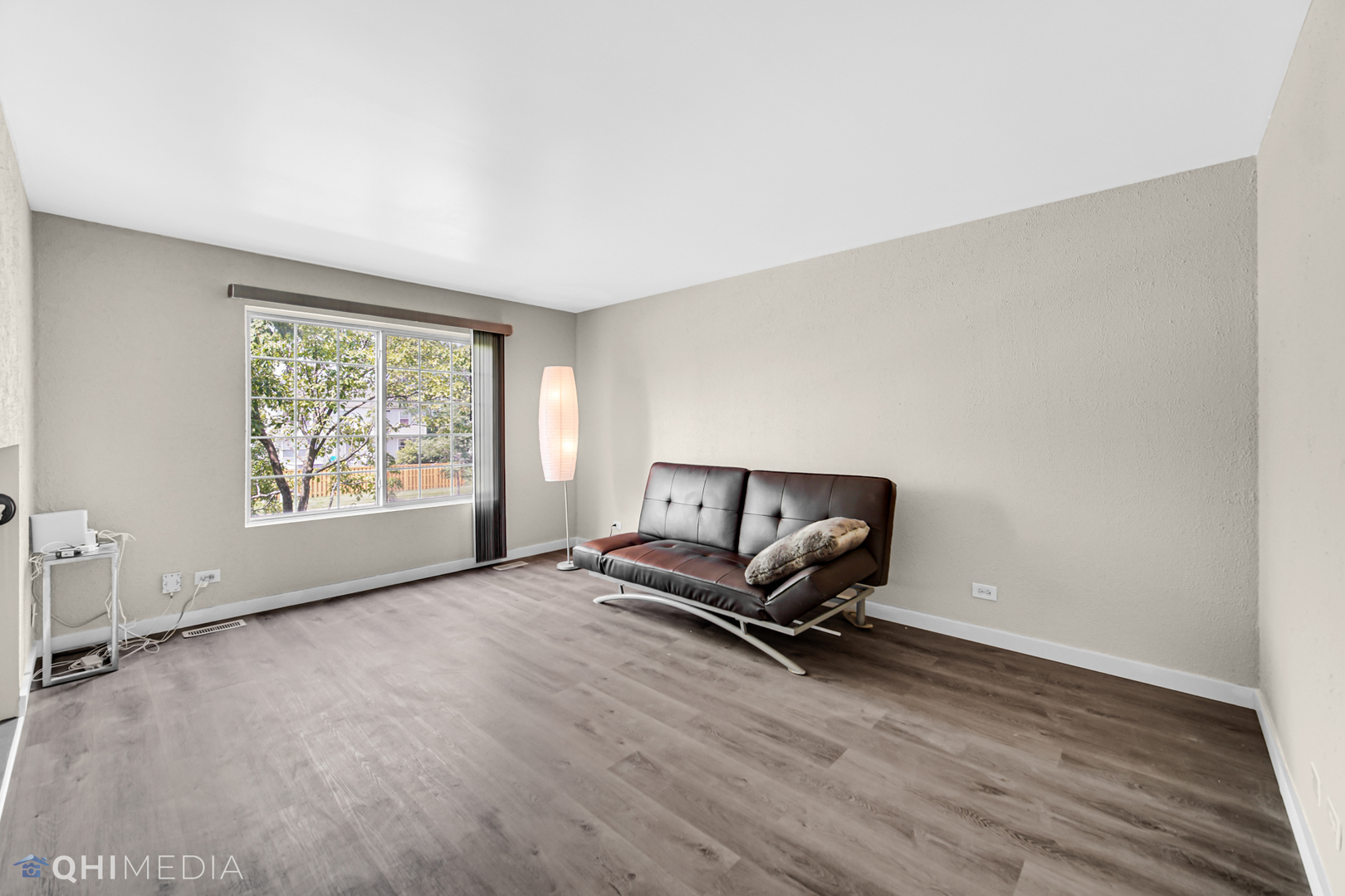 3159 Teal Bay Court Aurora, IL 60503 - Photo 4 of 22 a living room with furniture window and a wooden floor