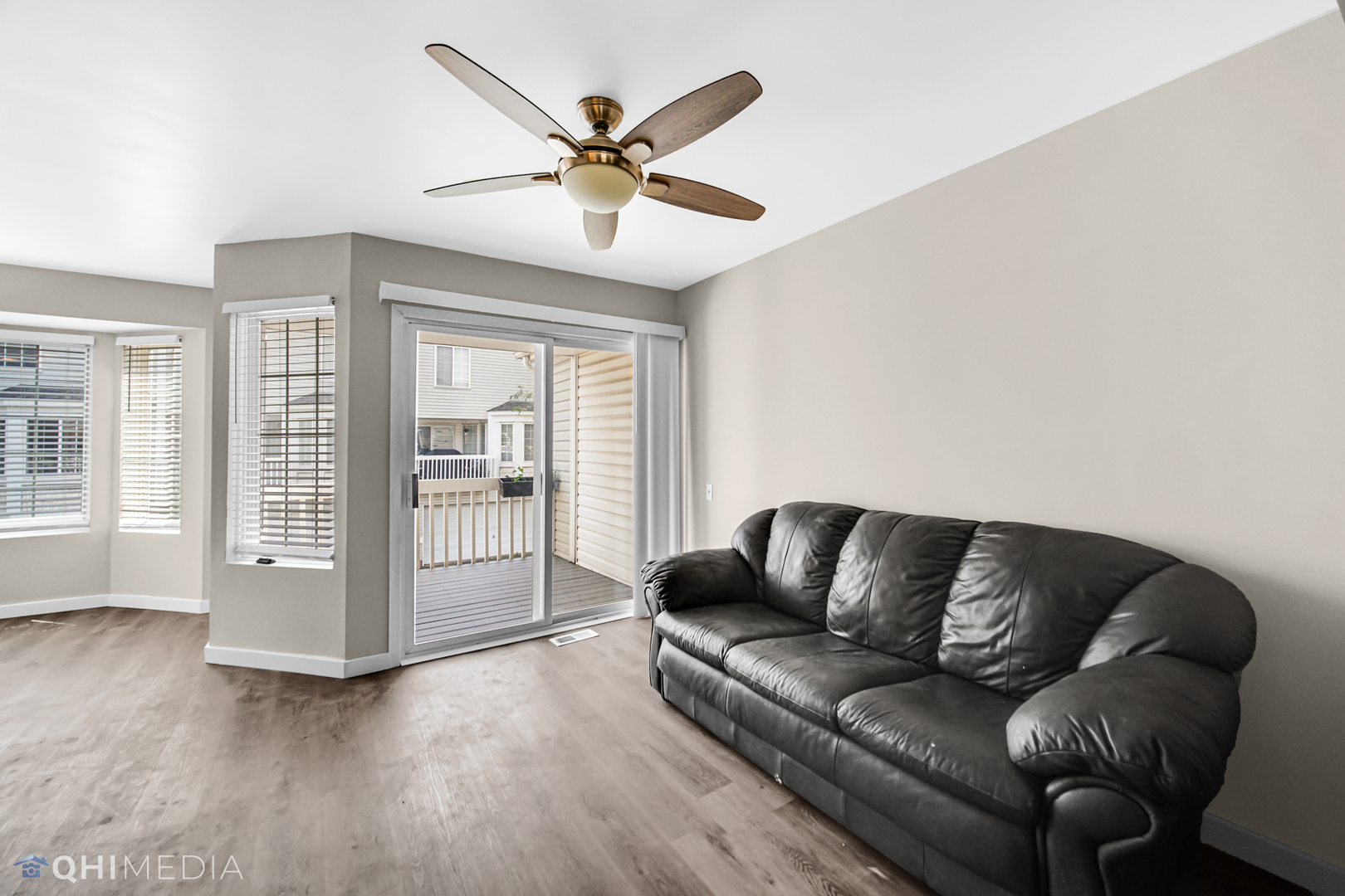 3159 Teal Bay Court Aurora, IL 60503 - Photo 6 of 22 a living room with furniture and a large window