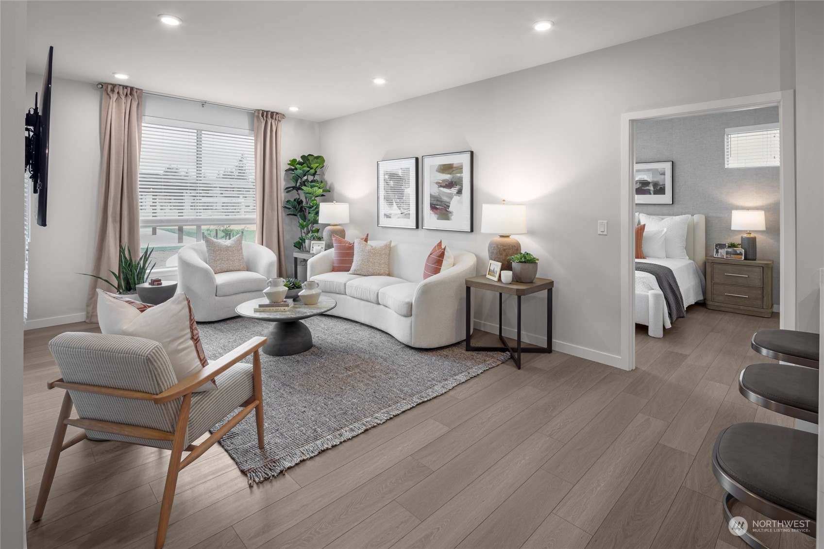 1237 Meander Way Southeast, Unit 101 North Bend, WA 98045 - Photo 5 of 13 a living room with furniture and a large window