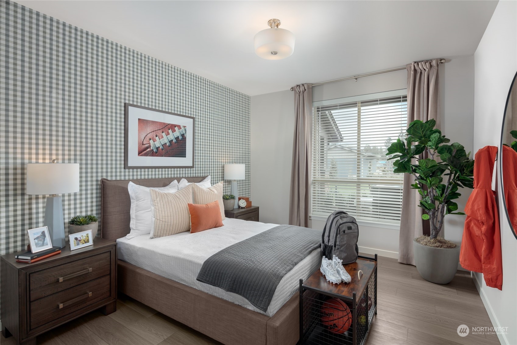 1237 Meander Way Southeast, Unit 101 North Bend, WA 98045 - Photo 9 of 13 a bedroom with a bed and a painting on the wall