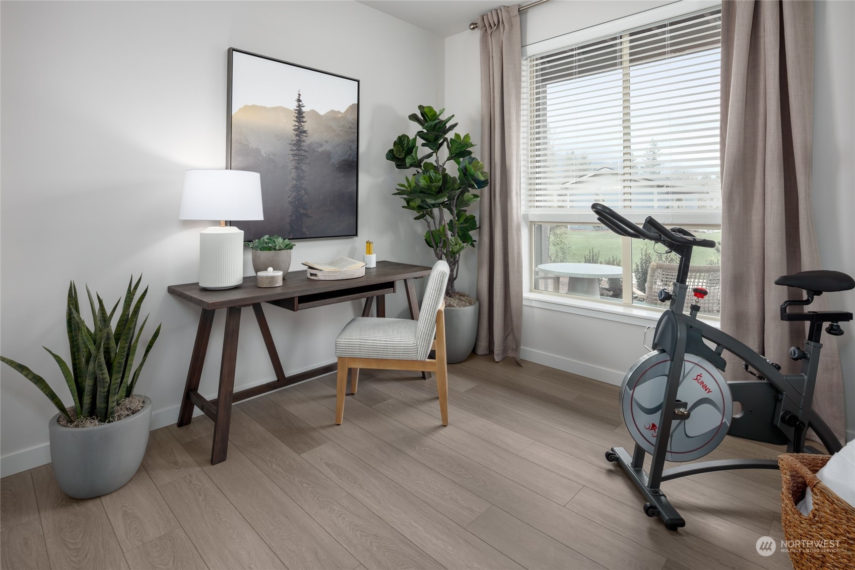 1237 Meander Way Southeast, Unit 101 North Bend, WA 98045 - Photo 10 of 13 a view of a workspace with furniture and a potted plant