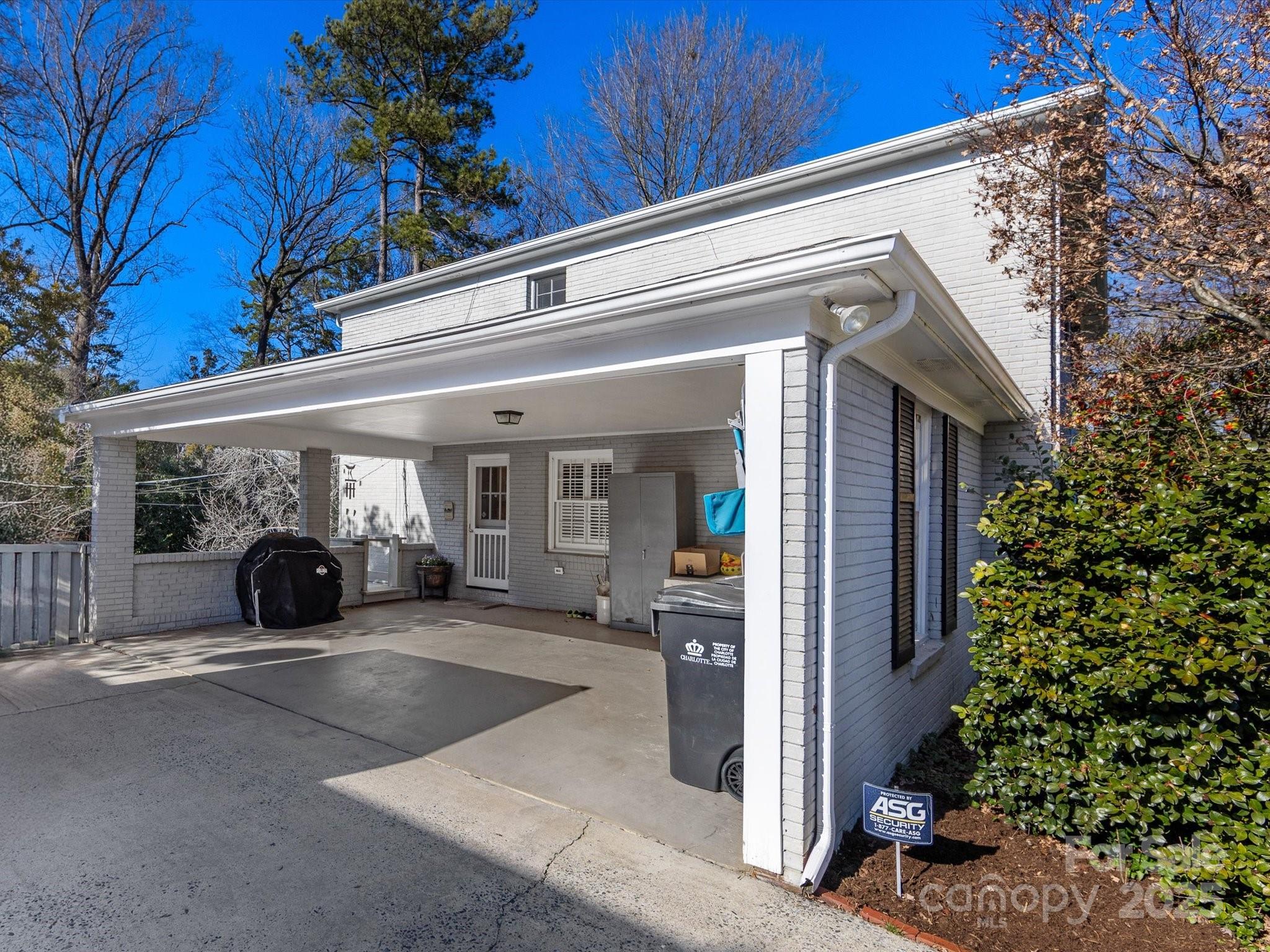 555 Manning Drive, Unit 7 Charlotte, NC 28209 - Photo 38 of 45 a view of a porch with seating space
