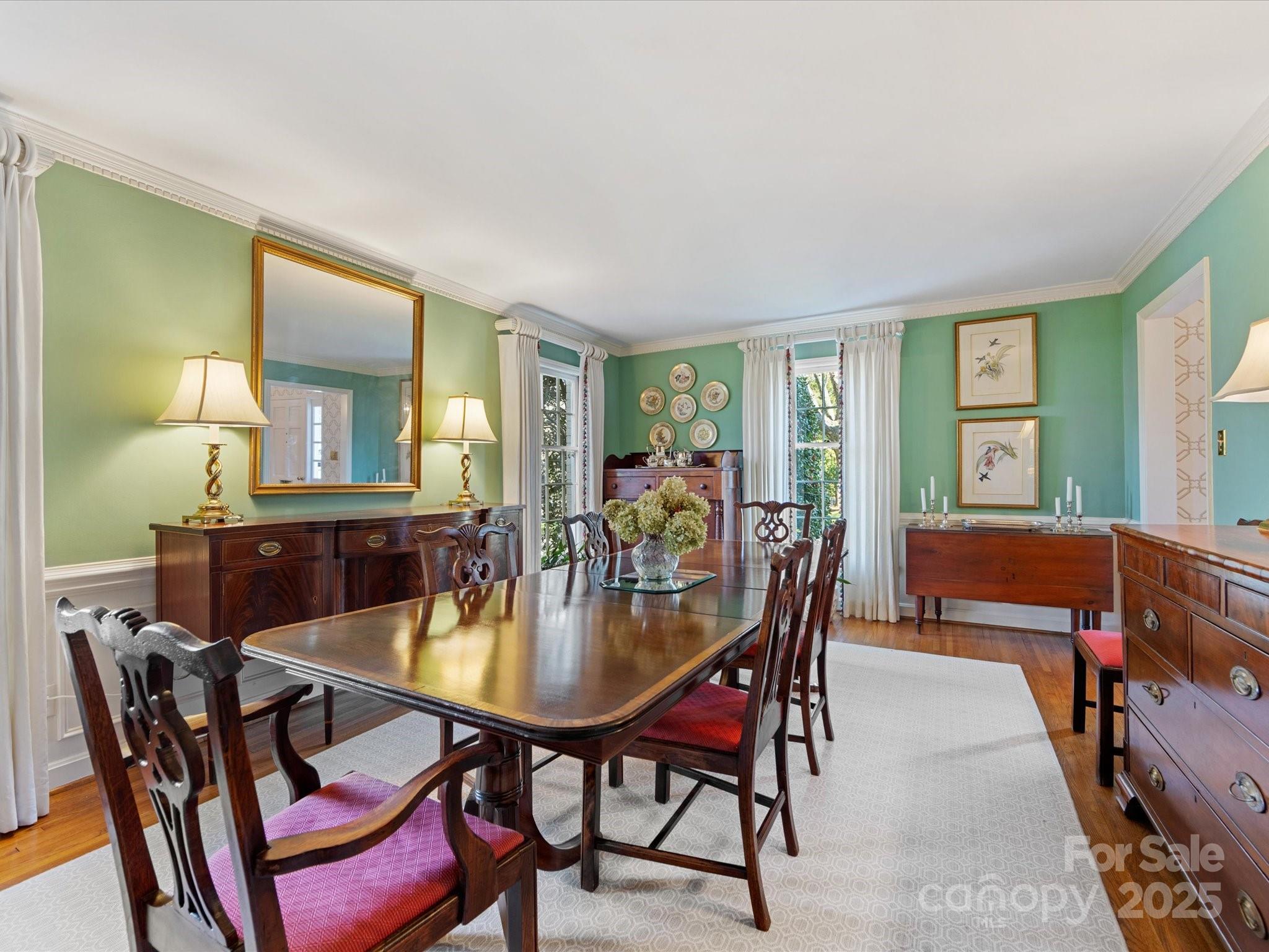 555 Manning Drive, Unit 7 Charlotte, NC 28209 - Photo 5 of 45 a dining room with furniture and window