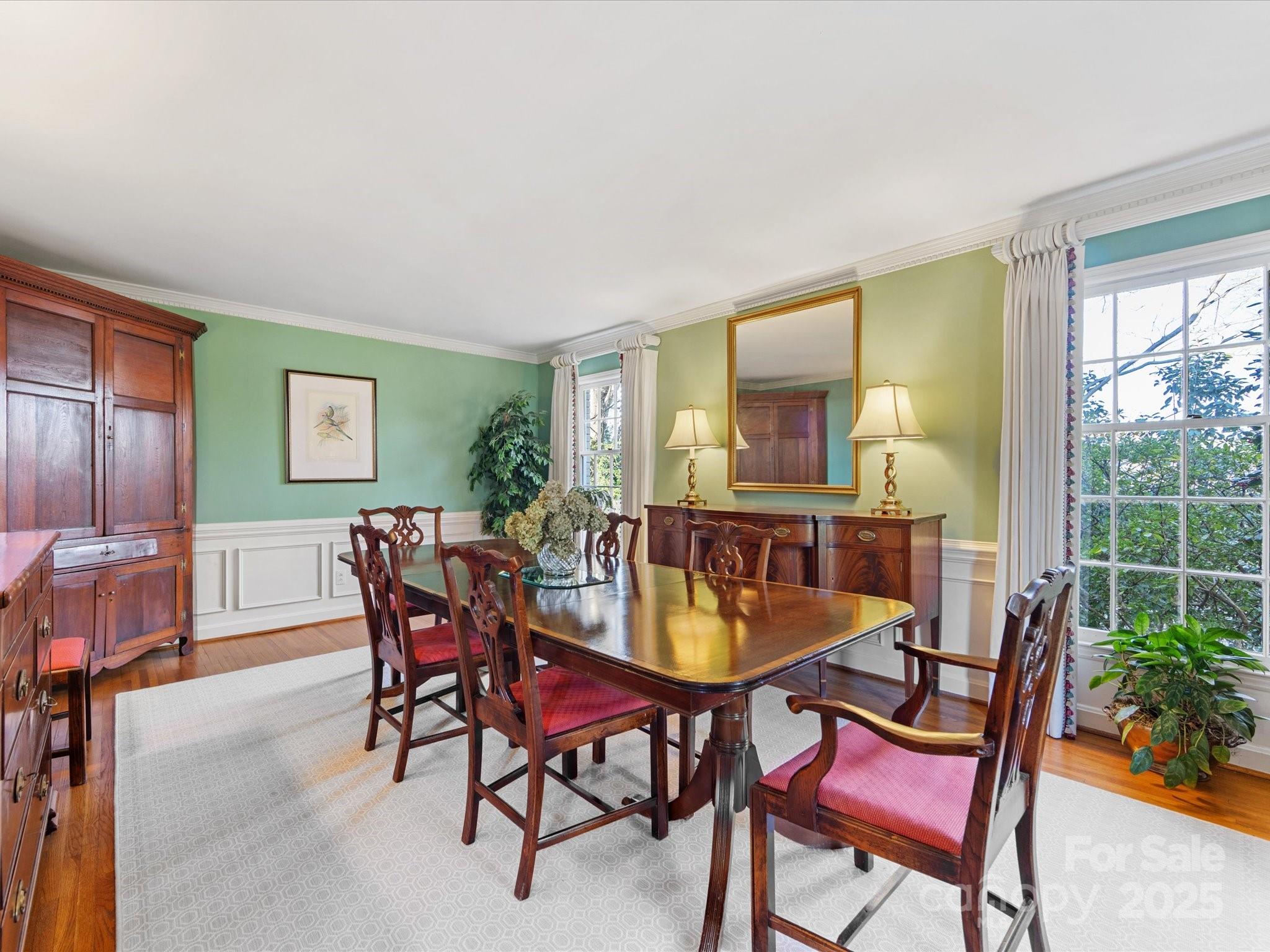 555 Manning Drive, Unit 7 Charlotte, NC 28209 - Photo 7 of 45 a view of a dining room with furniture and window
